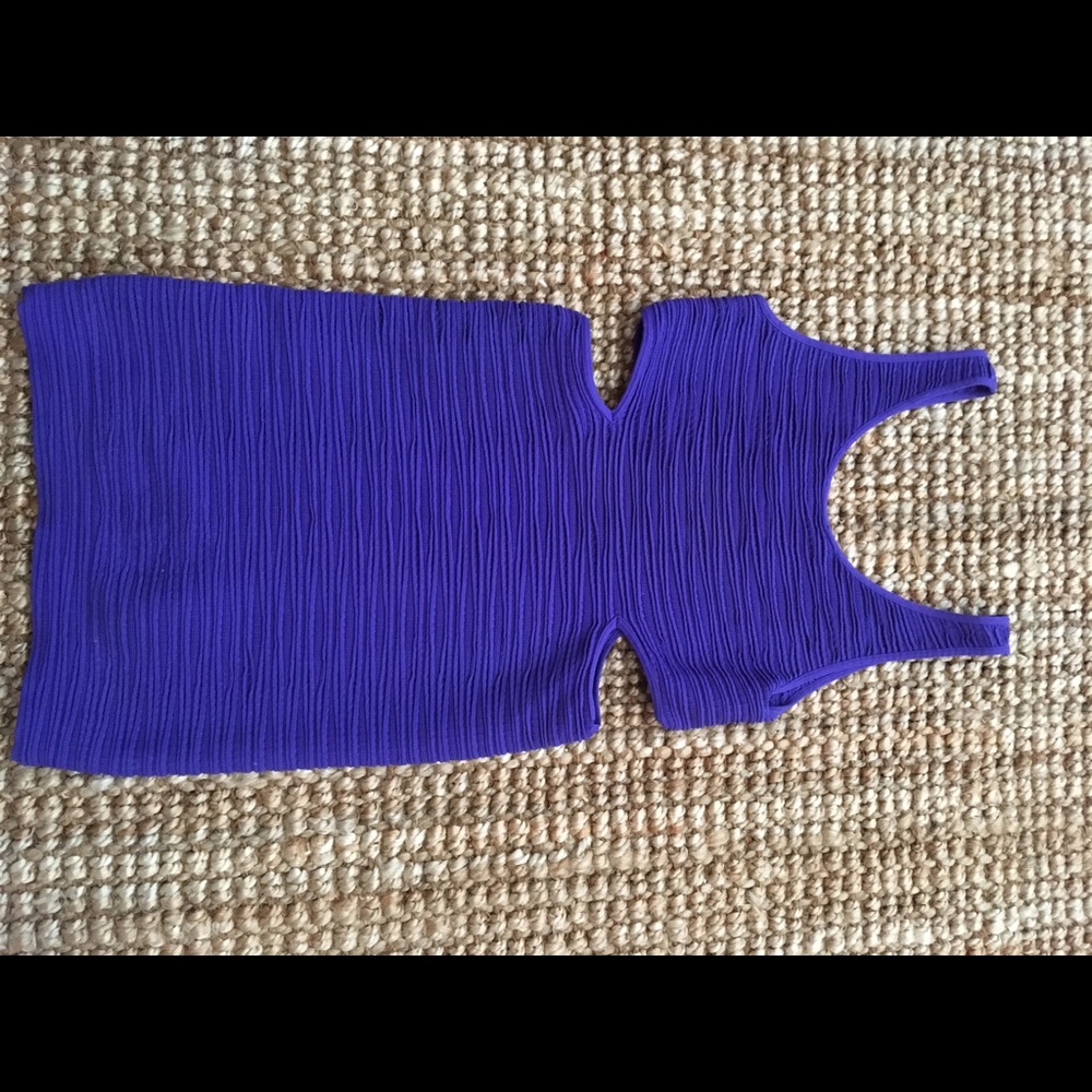 Tight mini Bebe dress with cutouts